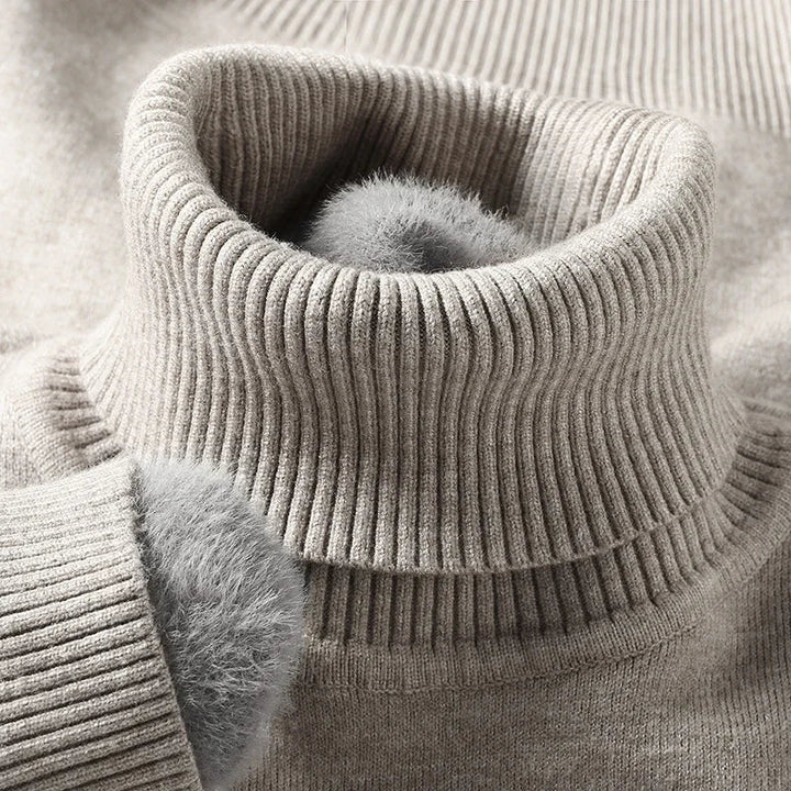 Close-up of the gray ribbed turtleneck collar with fleece lining