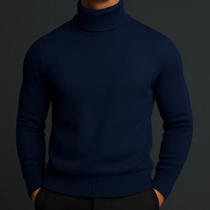 Man wearing a navy turtleneck knit pullover, front view