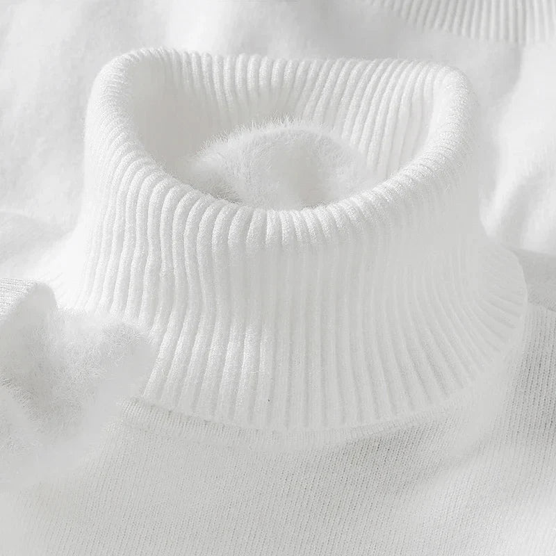 Close-up of the white ribbed turtleneck collar with soft fleece lining