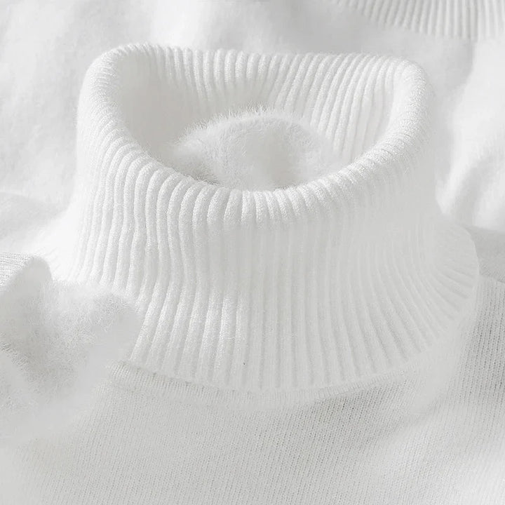 Close-up of the white ribbed turtleneck collar with soft fleece lining