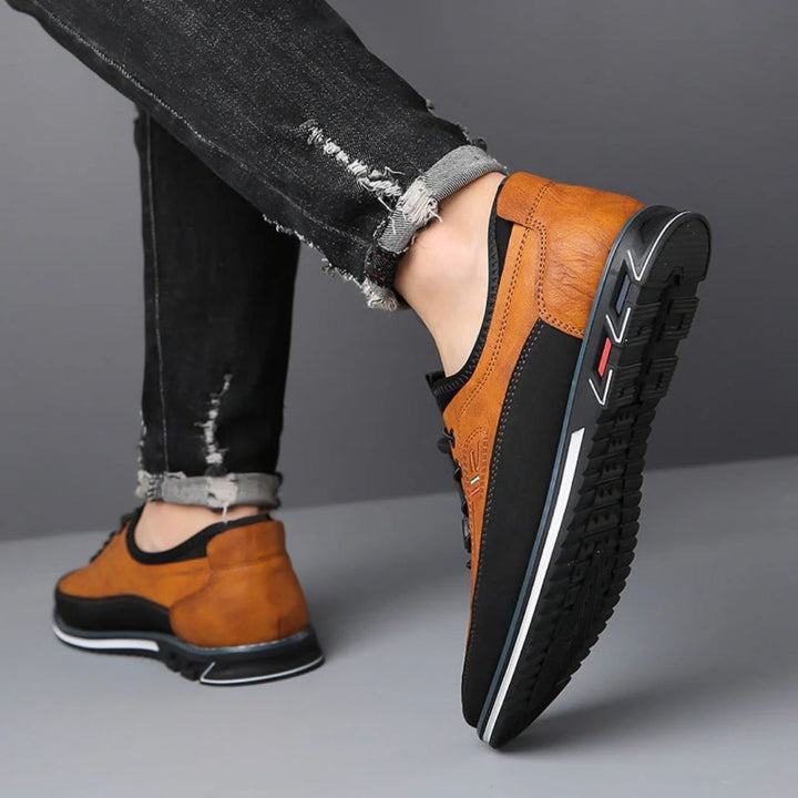 Camel two tone elastic lace sneakers worn with ripped jeans