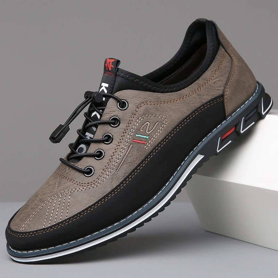 Taupe two tone elastic lace walking shoe with black sole, side view