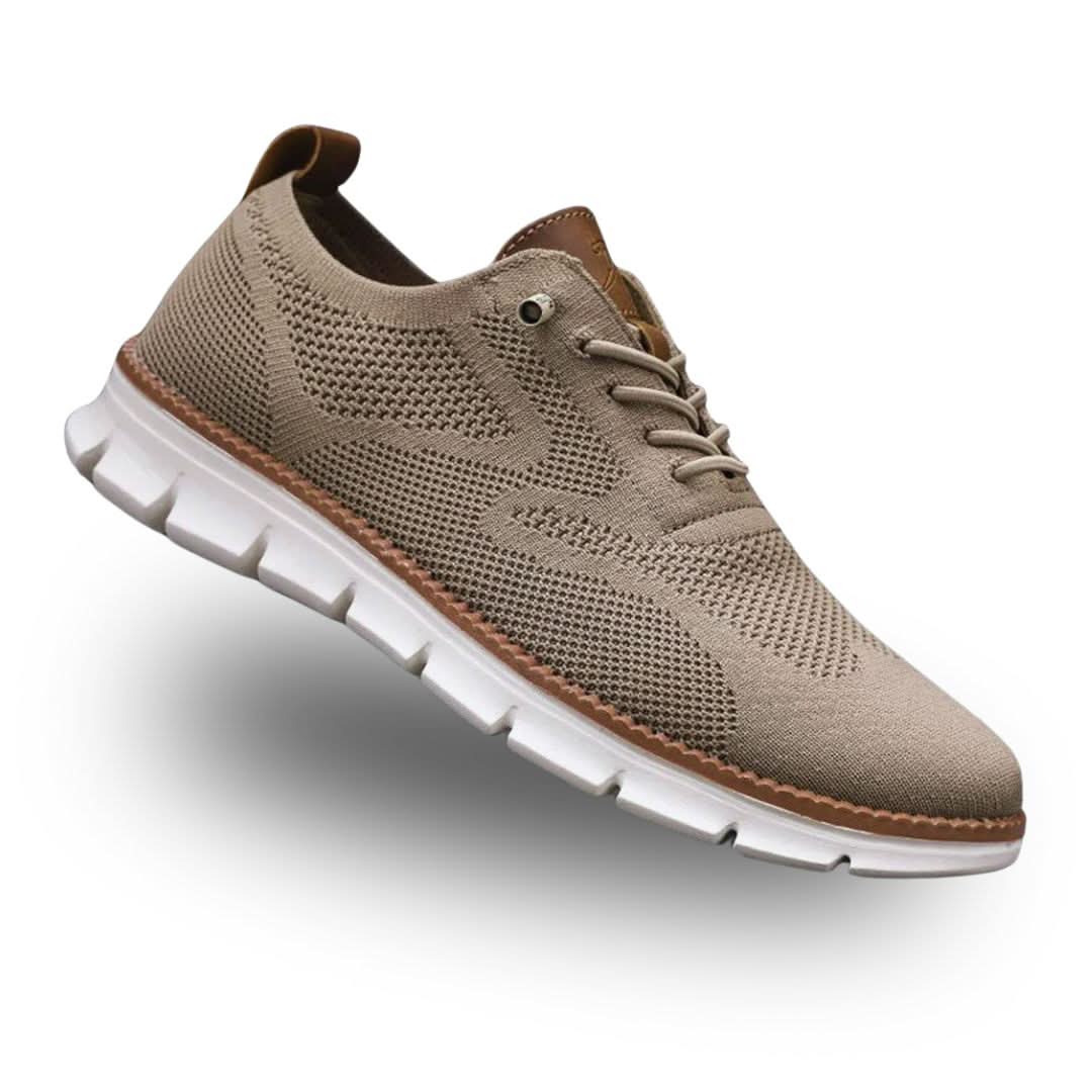 Taupe lace-up knit walking shoe with white sole, angled side view
