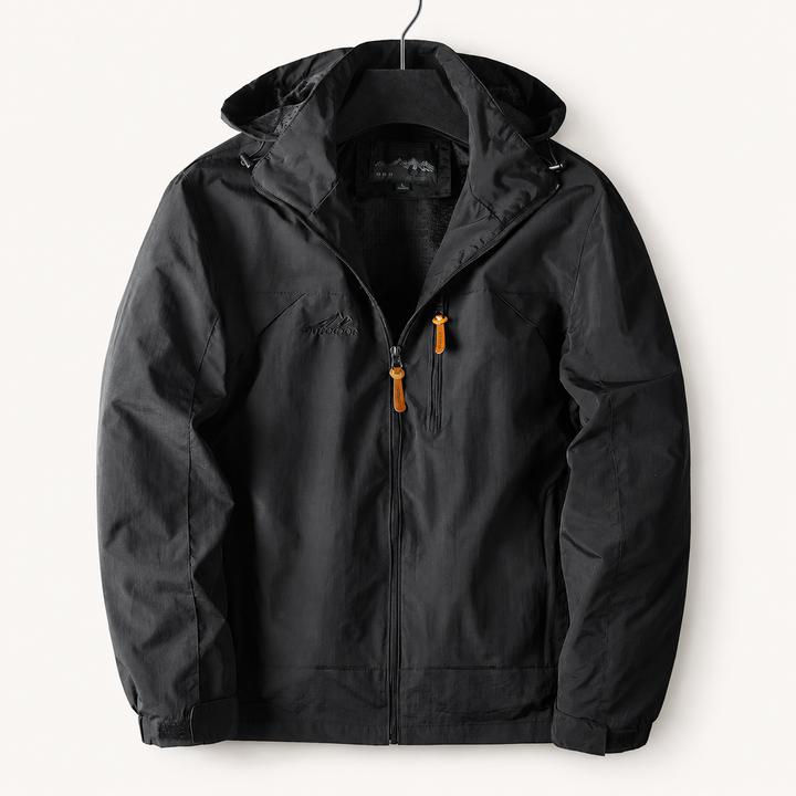 Black hooded windbreaker jacket with zip front on a hanger, front view