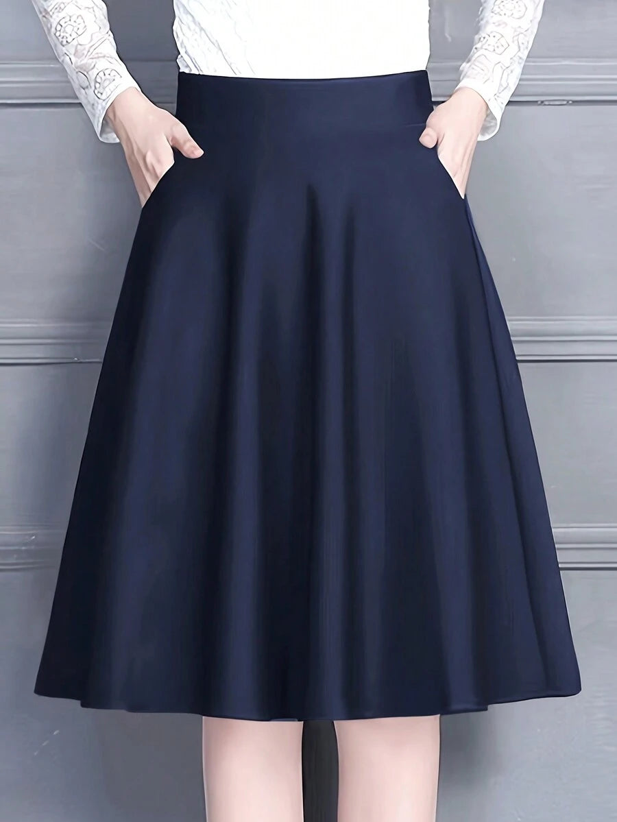 Women's a line skirt in navy, high waist midi with pockets, front view