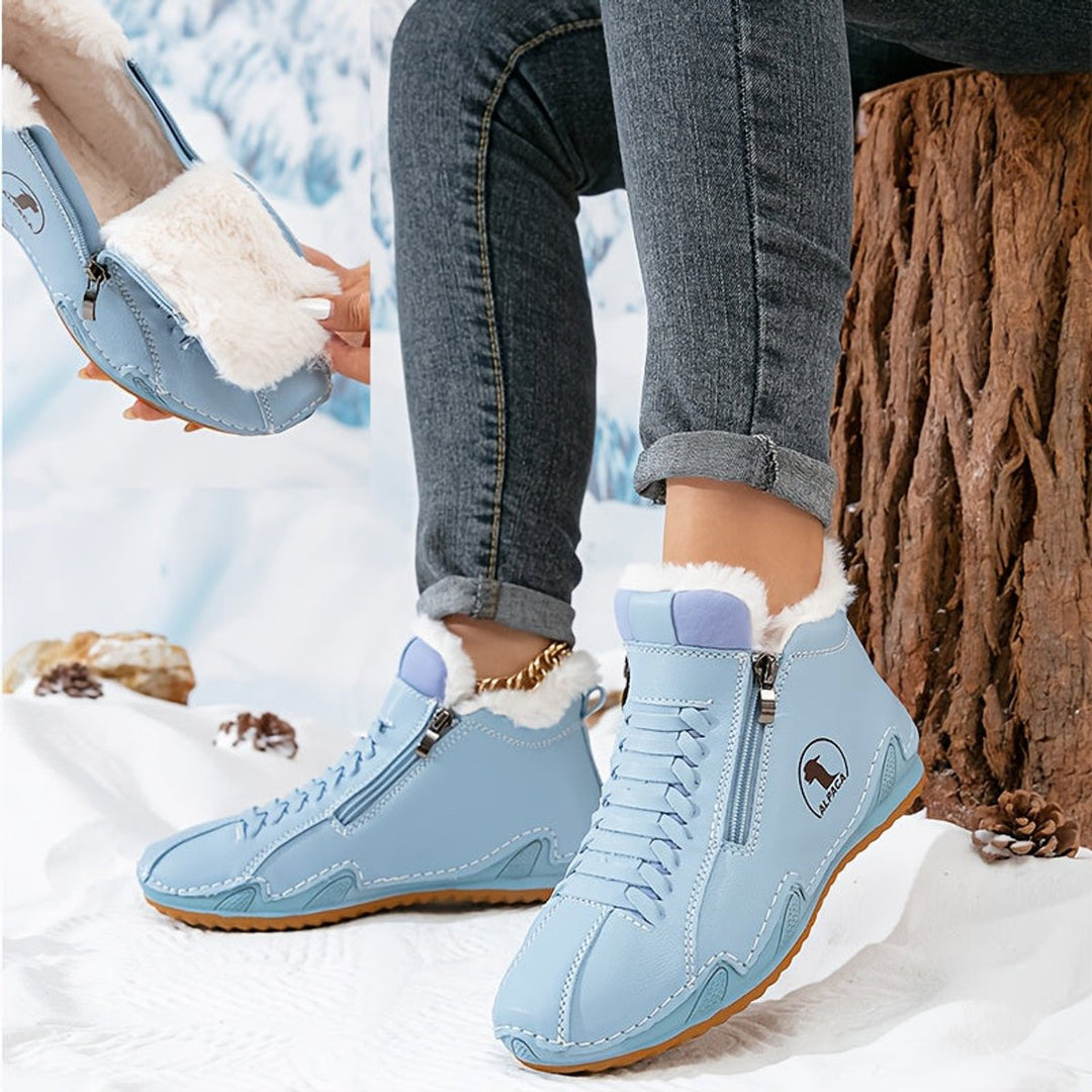 Light blue ankle boots with side zip and fur lining