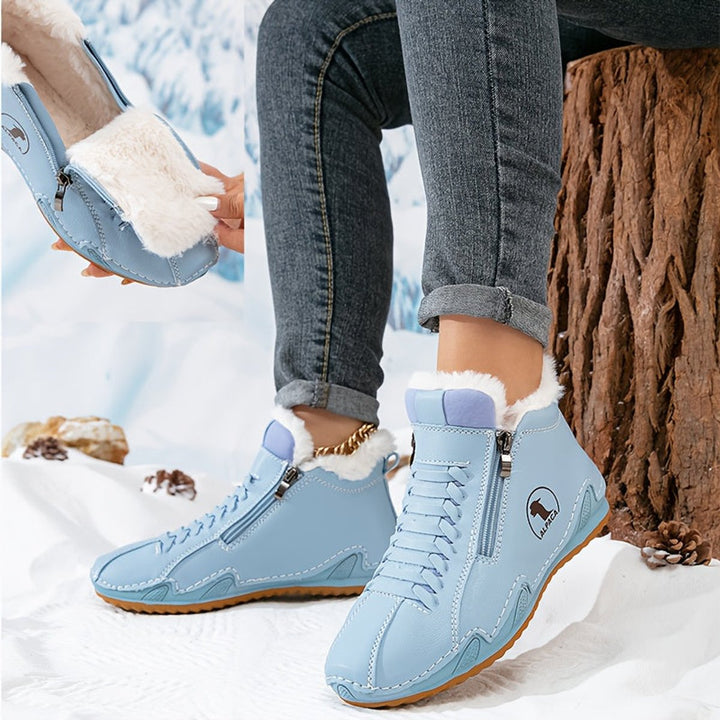 Light blue ankle boots with side zip and fur lining