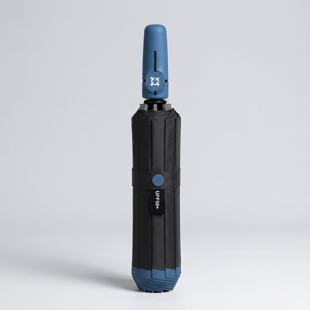 Automatic folding umbrella in blue accent, closed and standing upright