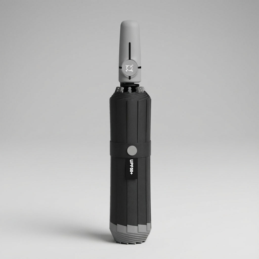 Automatic folding umbrella in gray accent, closed and standing upright