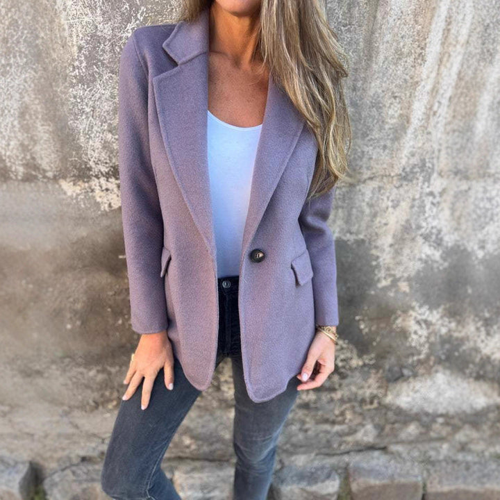 Lavender blazer with flap pockets worn open