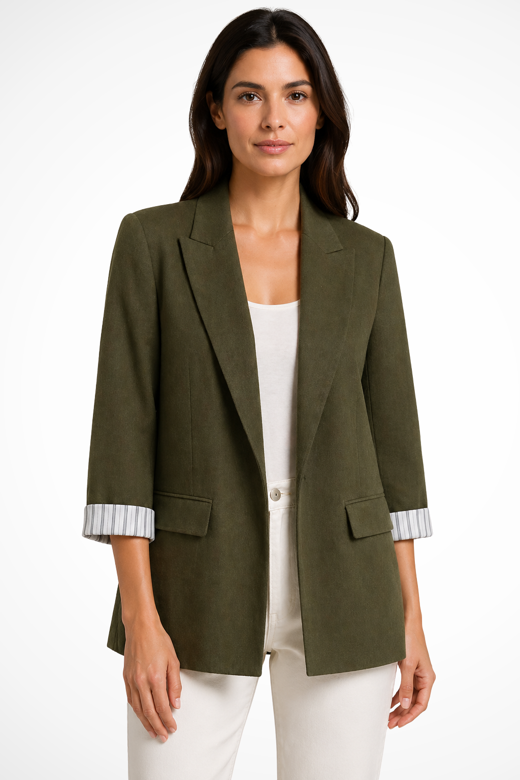 Olive green blazer worn open over a white top