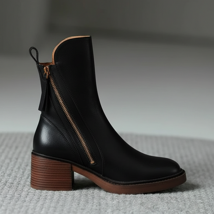 Black block heel bootie with side zip, side view showing the stacked heel