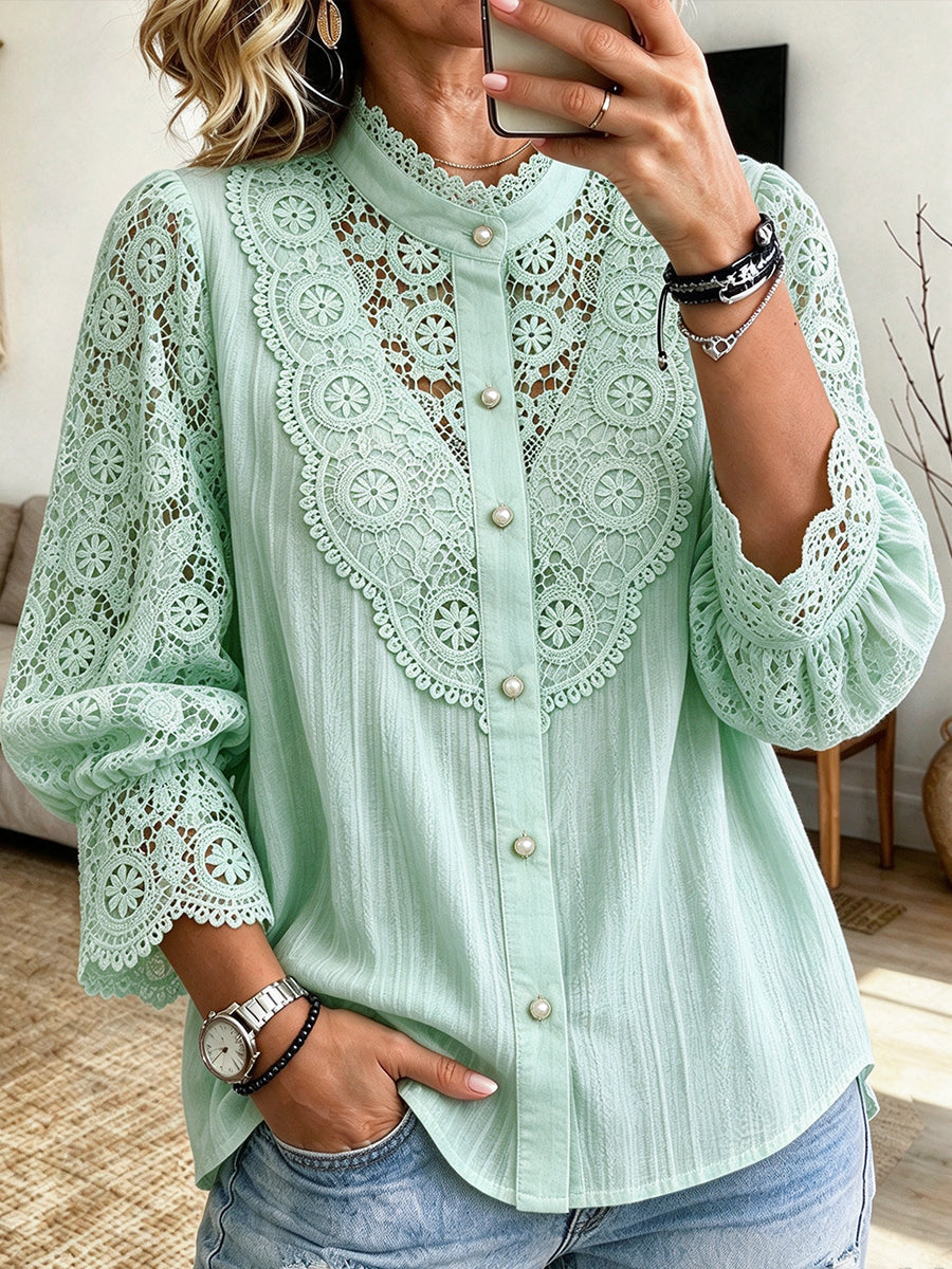 Mint blouse with openwork lace sleeves and textured body