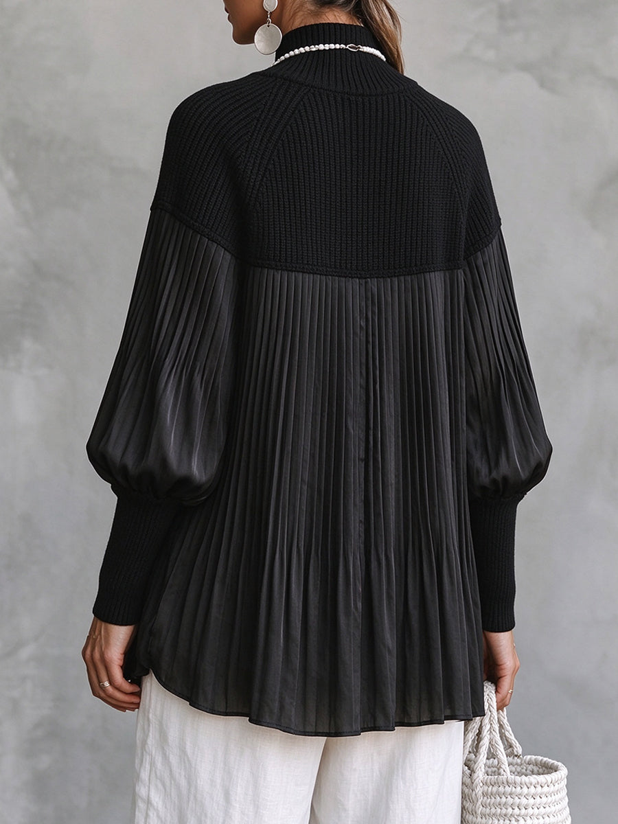 Back view of the pleated blouse with knit yoke and balloon sleeves