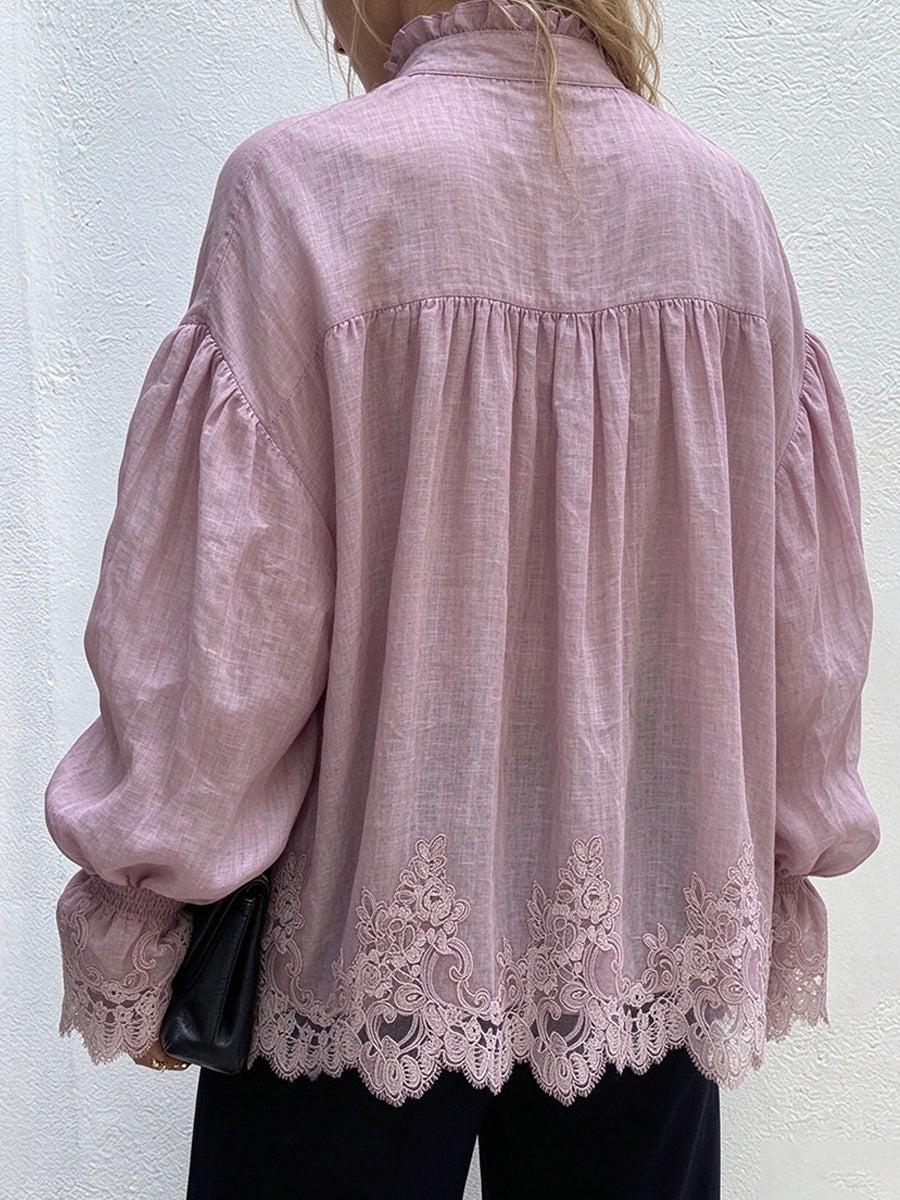 Back view of the mauve blouse with gathered yoke and scalloped lace hem