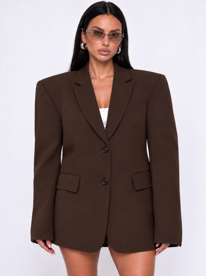 Dark brown oversized two button blazer front view with flap pockets