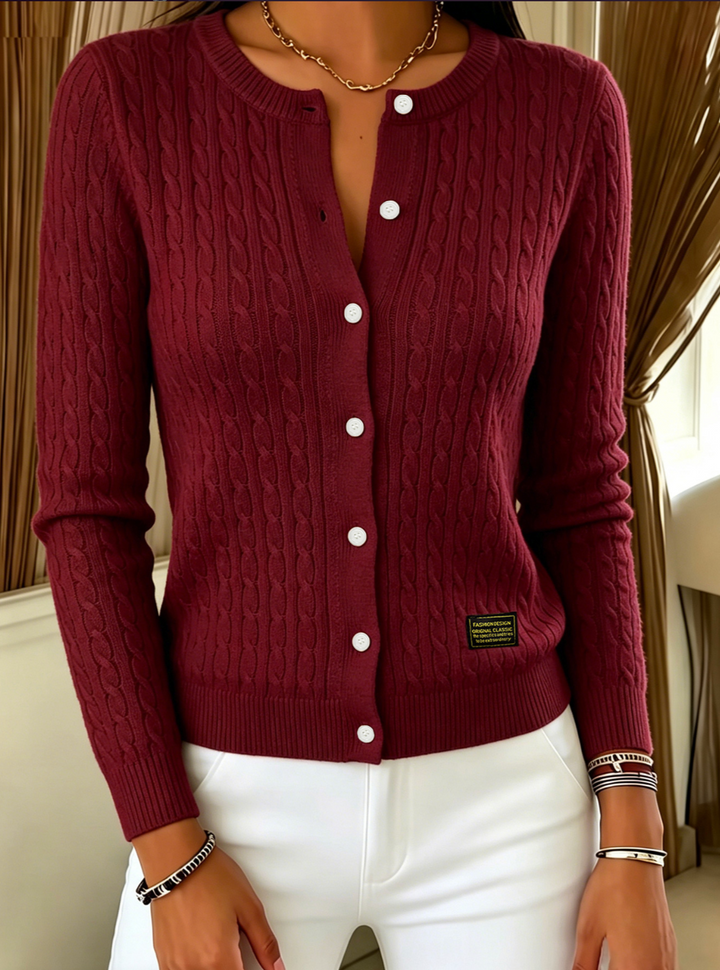 Burgundy cable knit cardigan with crew neck and pearl style buttons