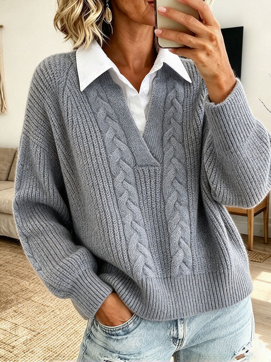 Gray cable knit sweater with raglan sleeves and white collar