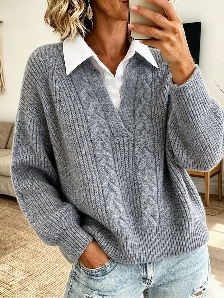 Gray cable knit sweater with raglan sleeves and white collar