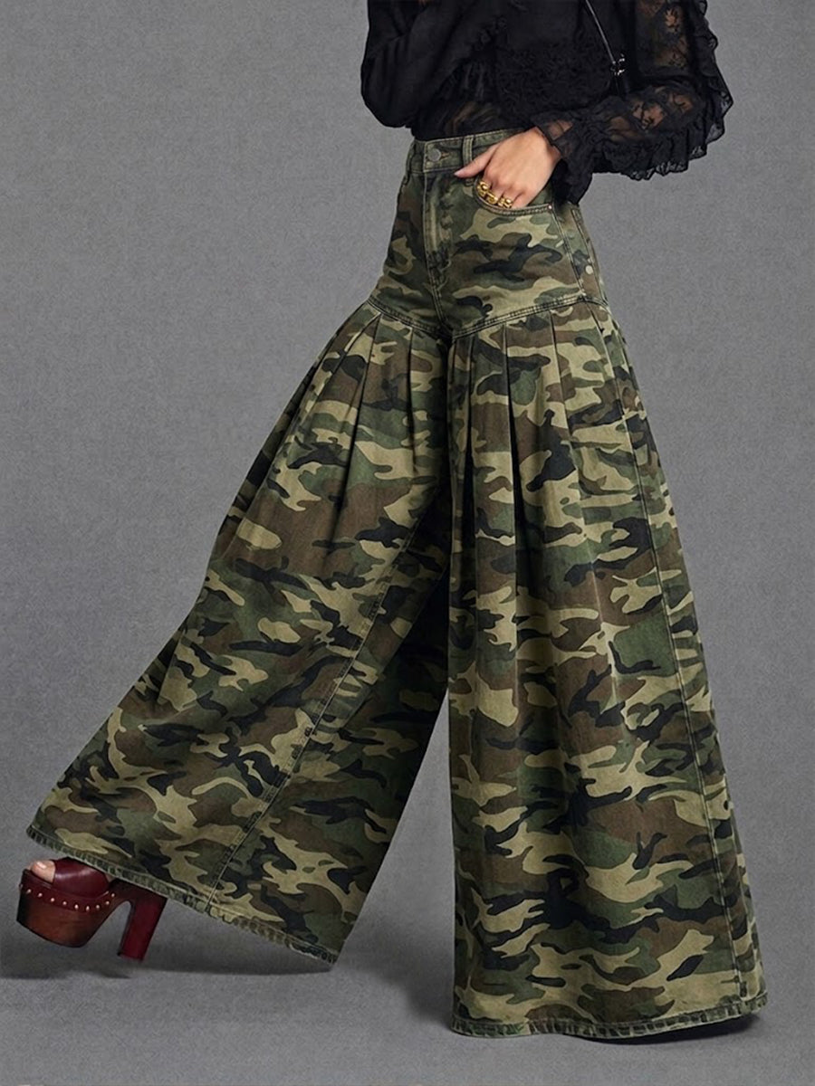 Side view of the camo pants worn with a black lace blouse and platform heels