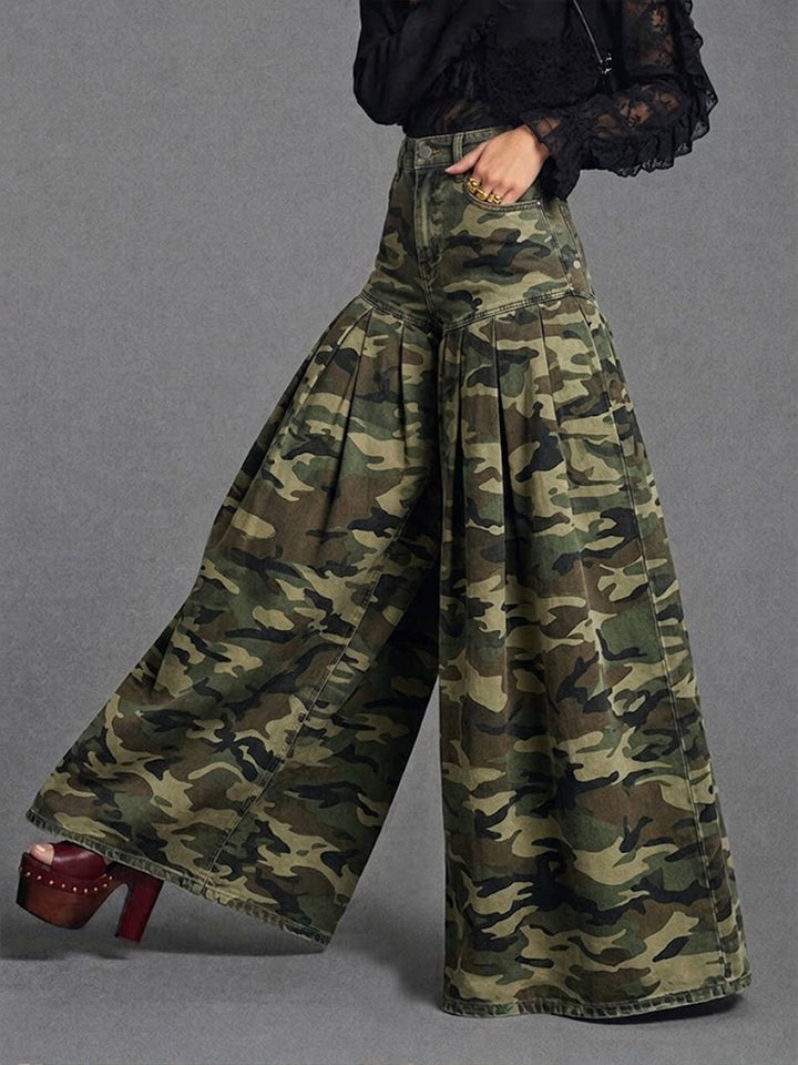 Side view of the camo pants worn with a black lace blouse and platform heels