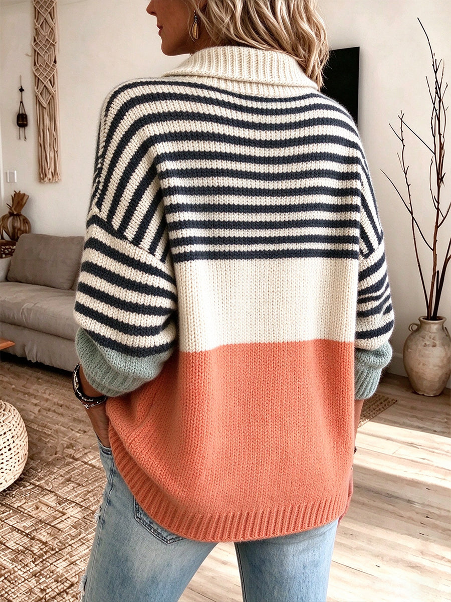 Back view of the striped cardigan with cream band and coral lower half
