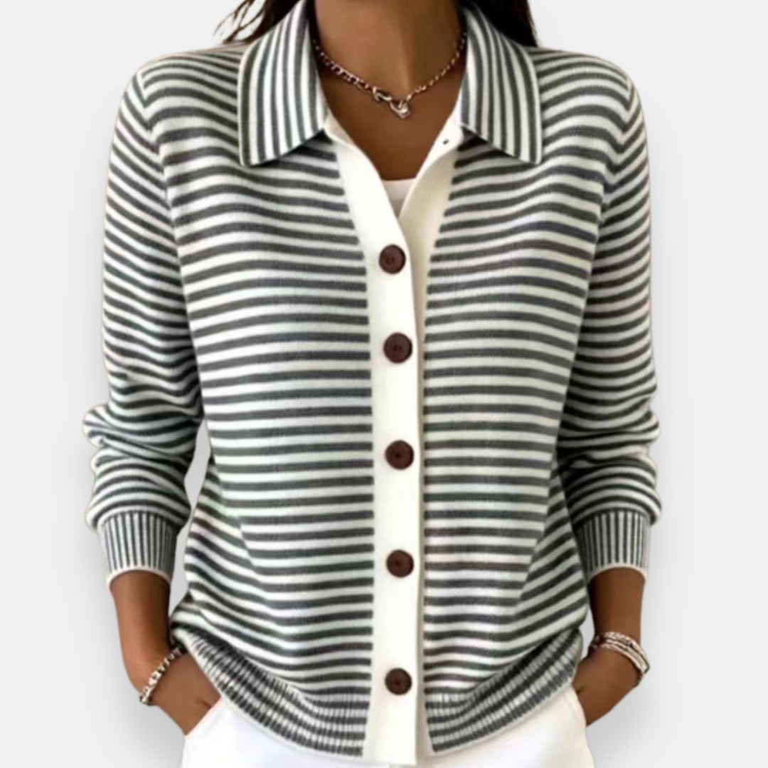 Black and white striped knit cardigan with button front, on model