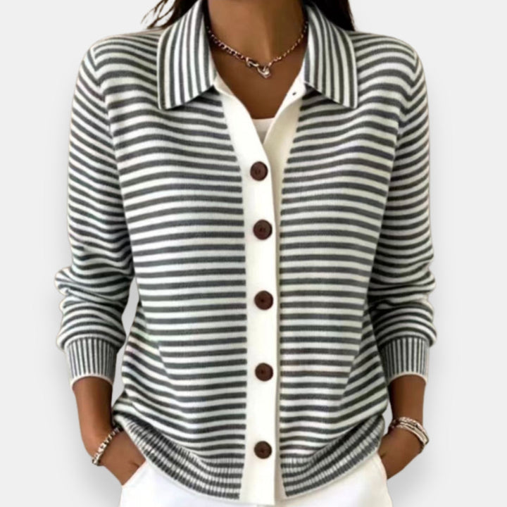 Black and white striped knit cardigan with button front, on model