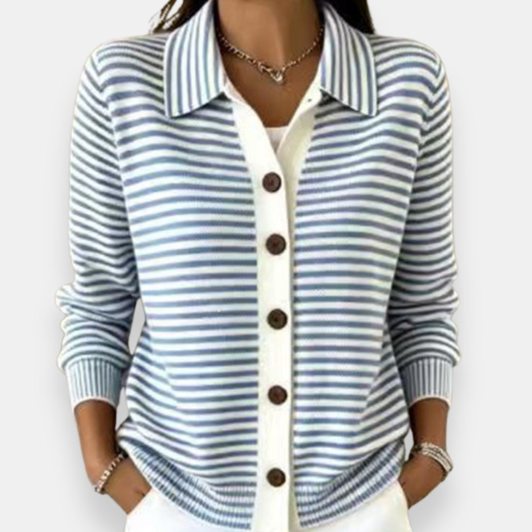 Light blue striped button front cardigan with collar, worn with white bottoms