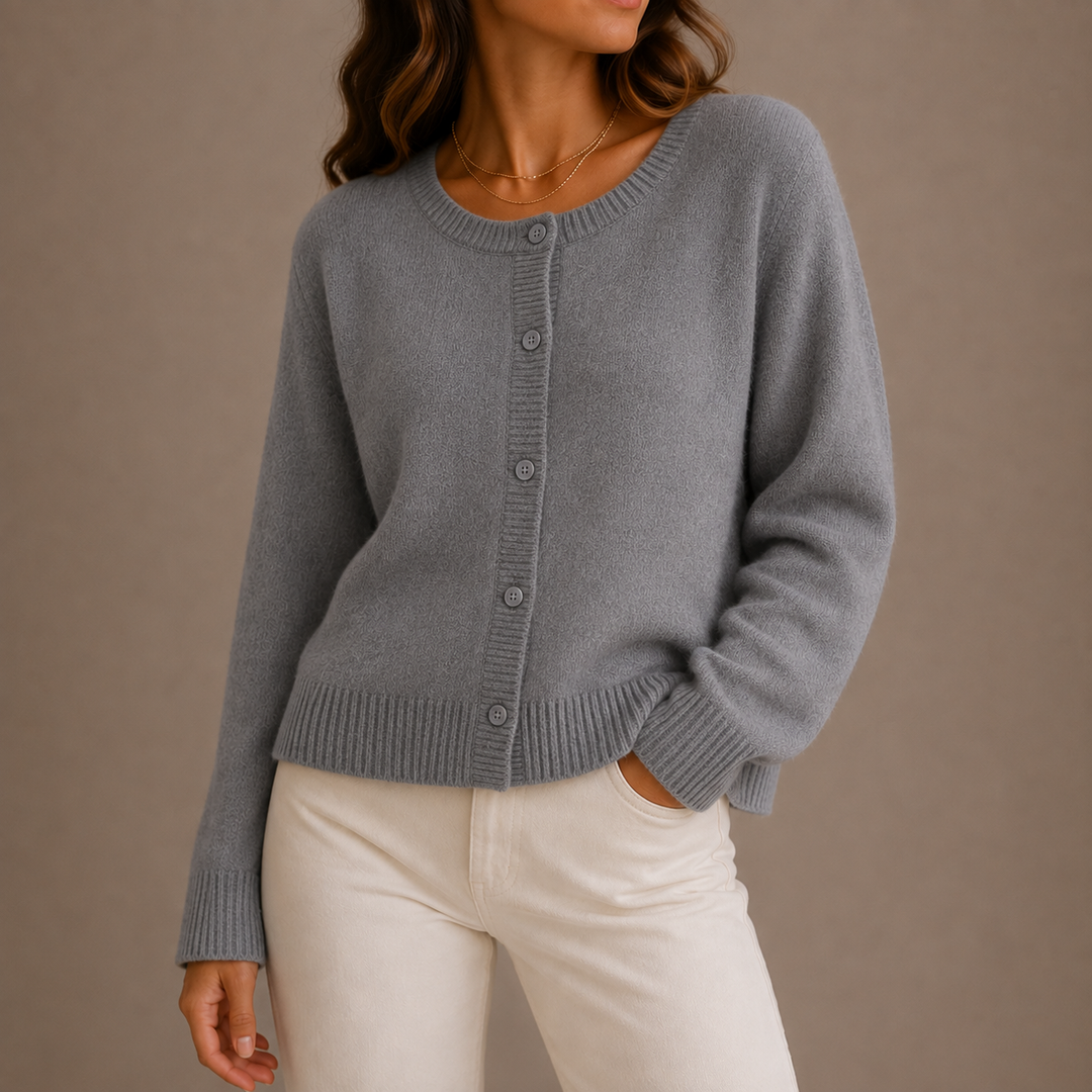 Women's gray button up cardigan, front view on a model