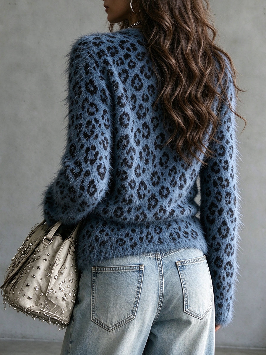 Back view of the fuzzy leopard cardigan with long relaxed sleeves