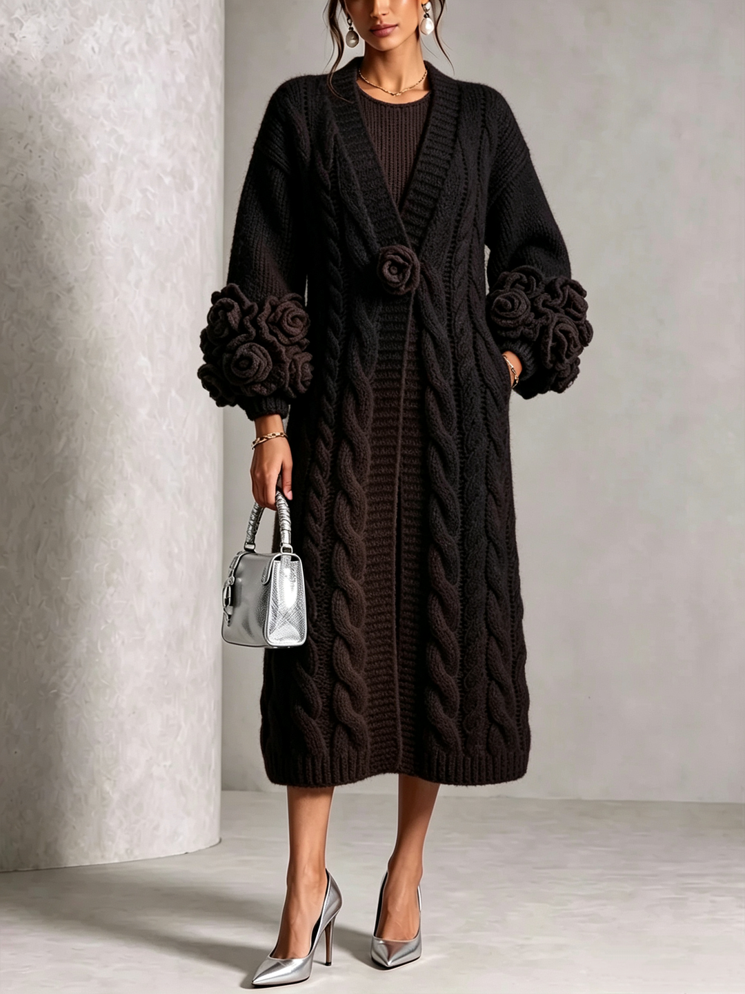 Black long cardigan sweater with tie waist and puff sleeves