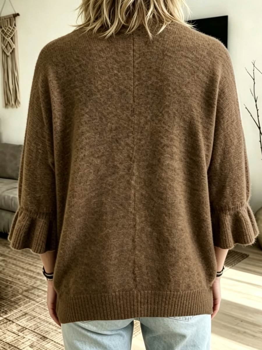 Back view of the mocha cardigan showing the dropped shoulders and ribbed hem