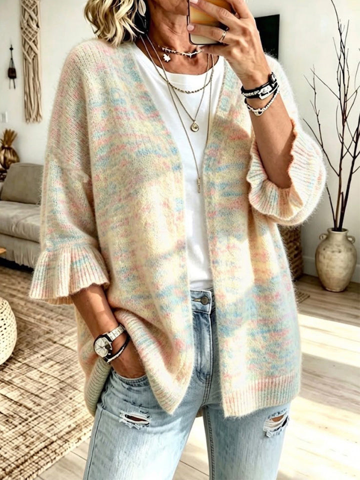 Pastel multi space-dyed knit cardigan worn over a white tee