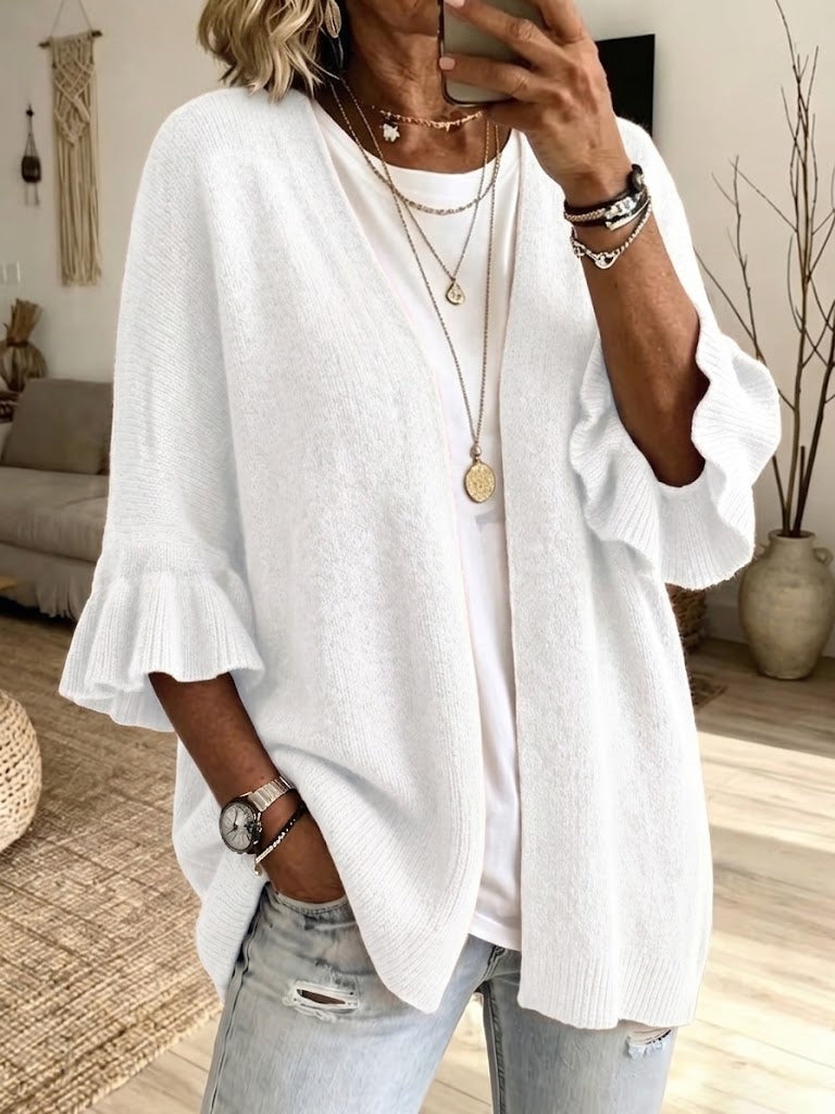 White lightweight knit cardigan with soft bell cuffs