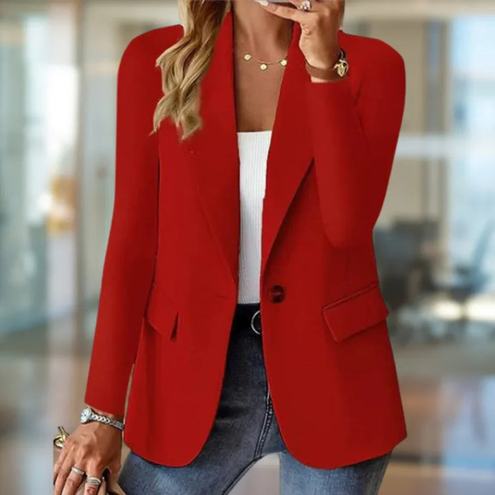 Red single button blazer jacket, front view over a white top with jeans