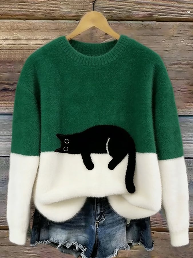 Dark green two tone cat sweater with a black cat on the white panel