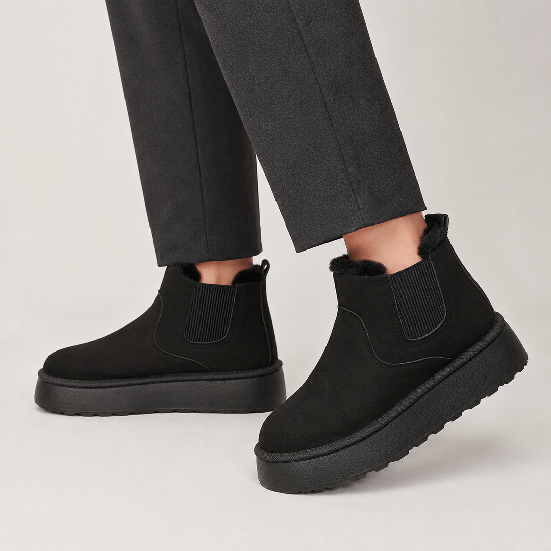 Black platform mini chelsea boots with pull tab
