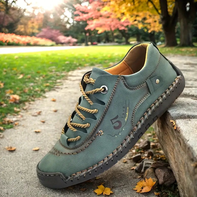 Women's comfort shoes in green, stitched lace up with wide round toe in a park