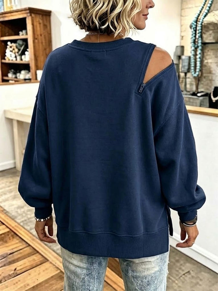 Back view of the navy sweatshirt with the zipped shoulder opening