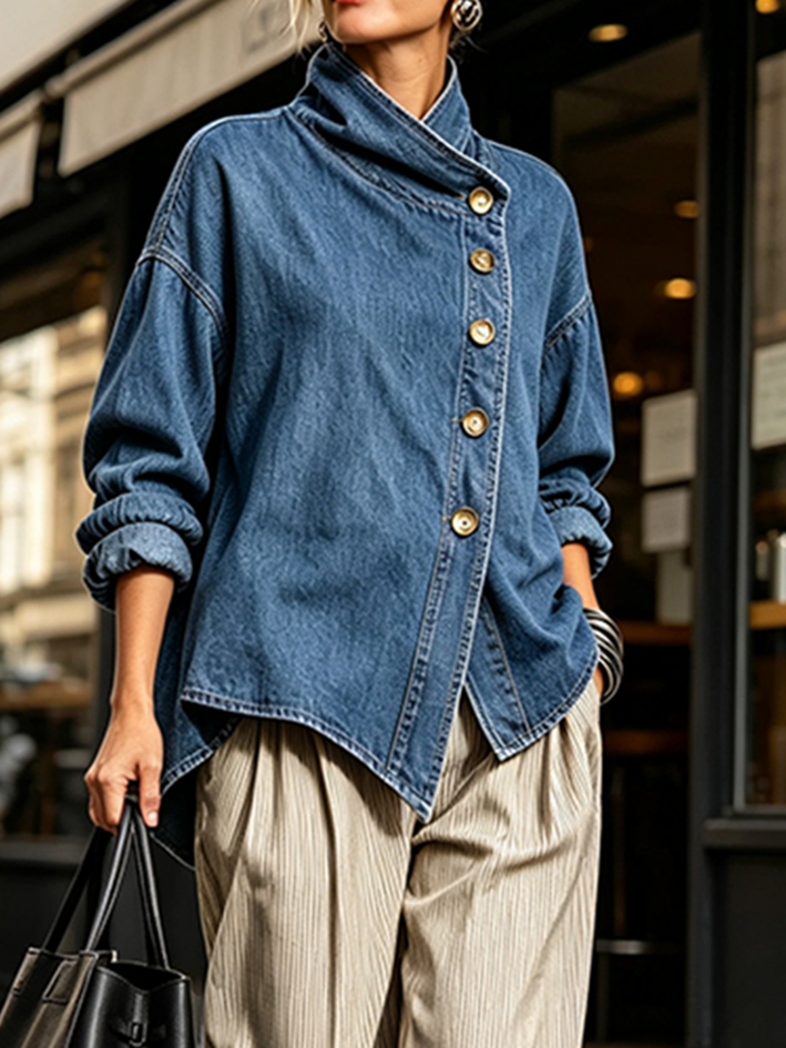 Side view of the off-center button placket and gathered cuffs