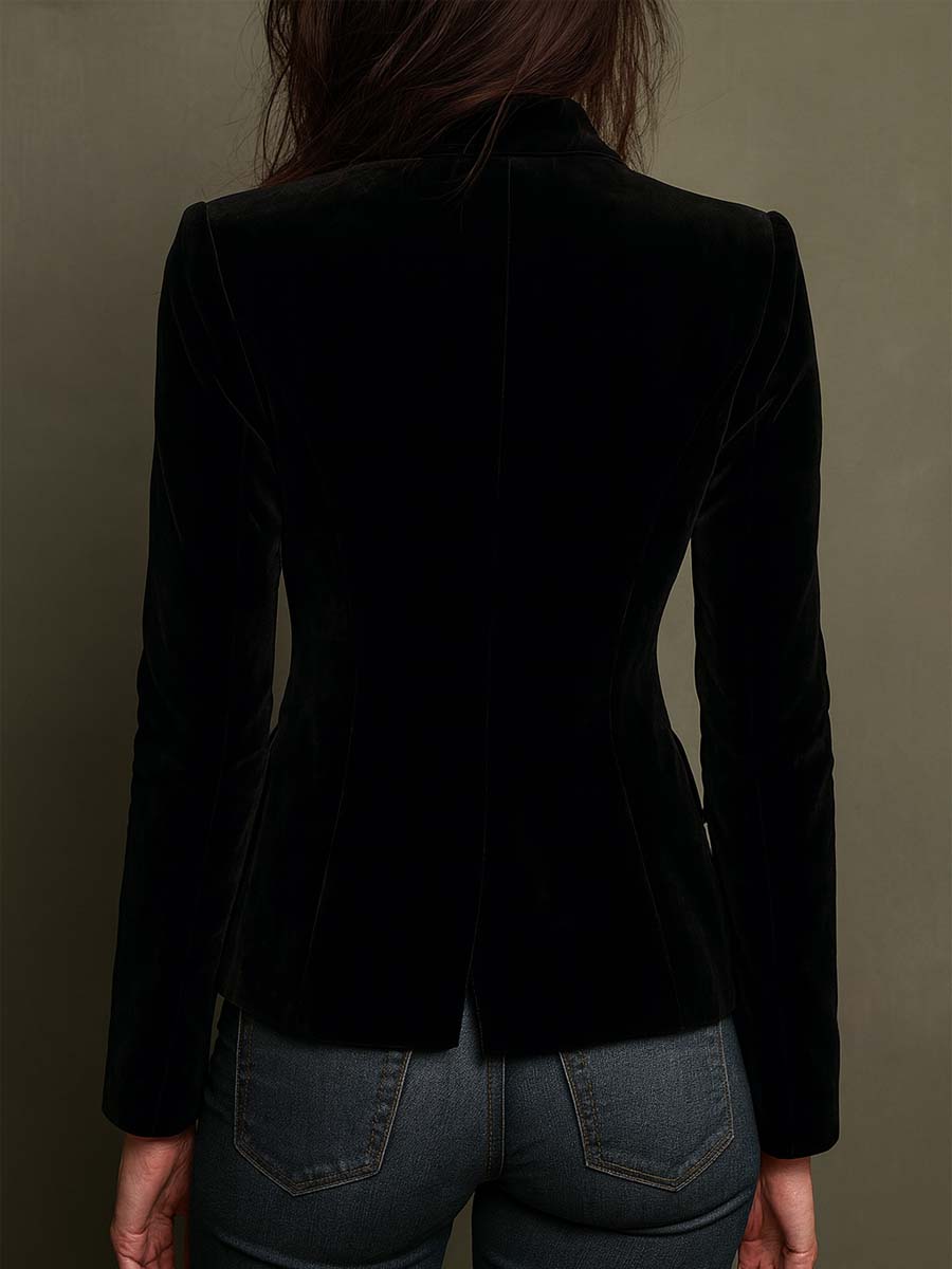 Back view of the black velvet-look fitted blazer