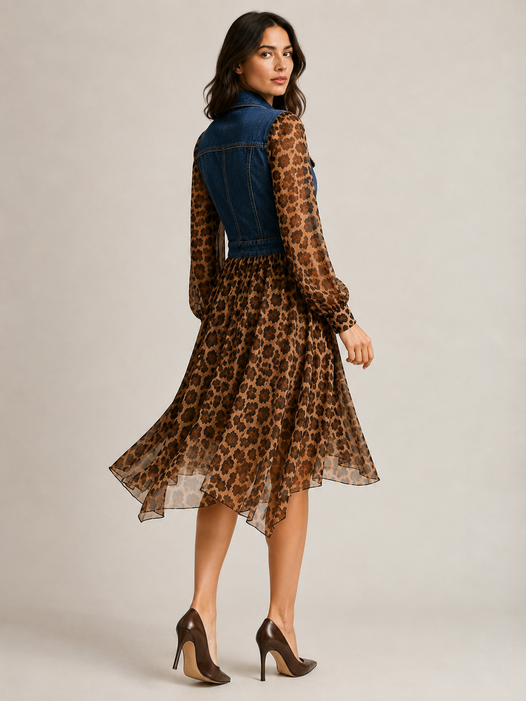Back view of the dark blue leopard dress while walking