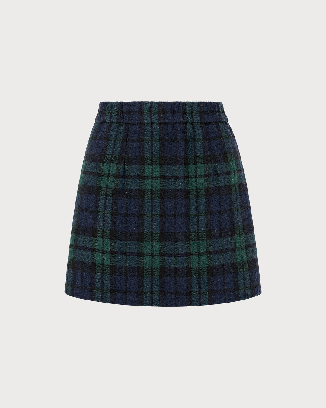 Second flat view of the green and navy plaid mini skirt on a plain background