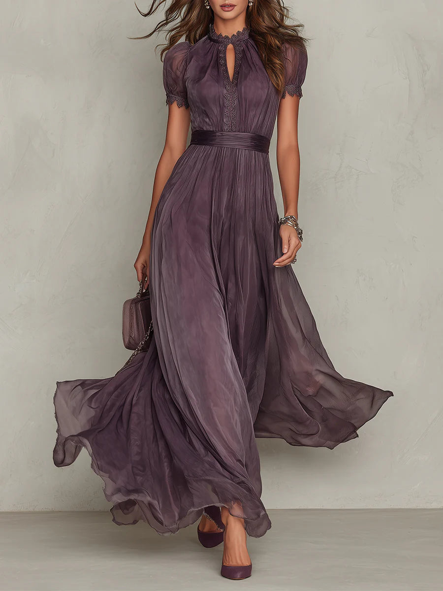 Women's mauve flowy belted maxi dress, front view with the skirt in motion