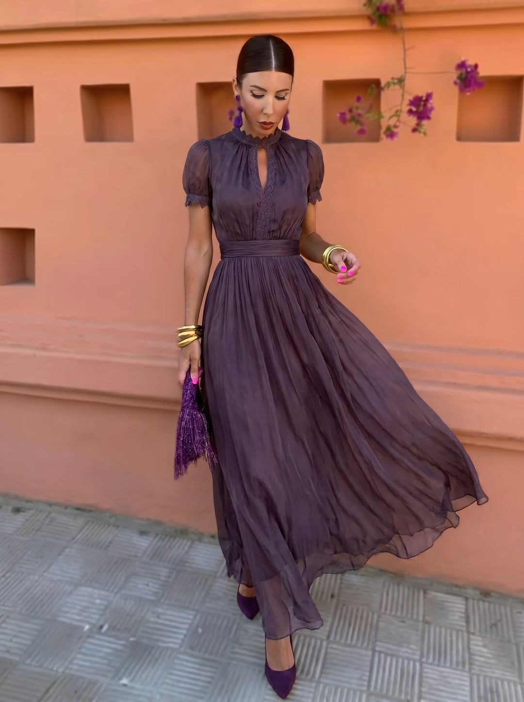 Women's fall wedding guest dress in plum, pleated maxi with puff sleeves