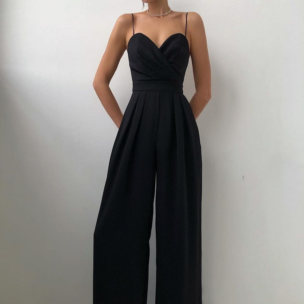 Women's formal jumpsuit in black, spaghetti strap pleated wide leg