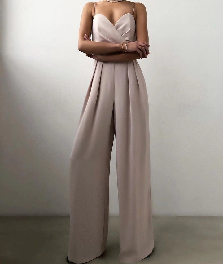 Nude wide leg jumpsuit with front pleats and thin straps