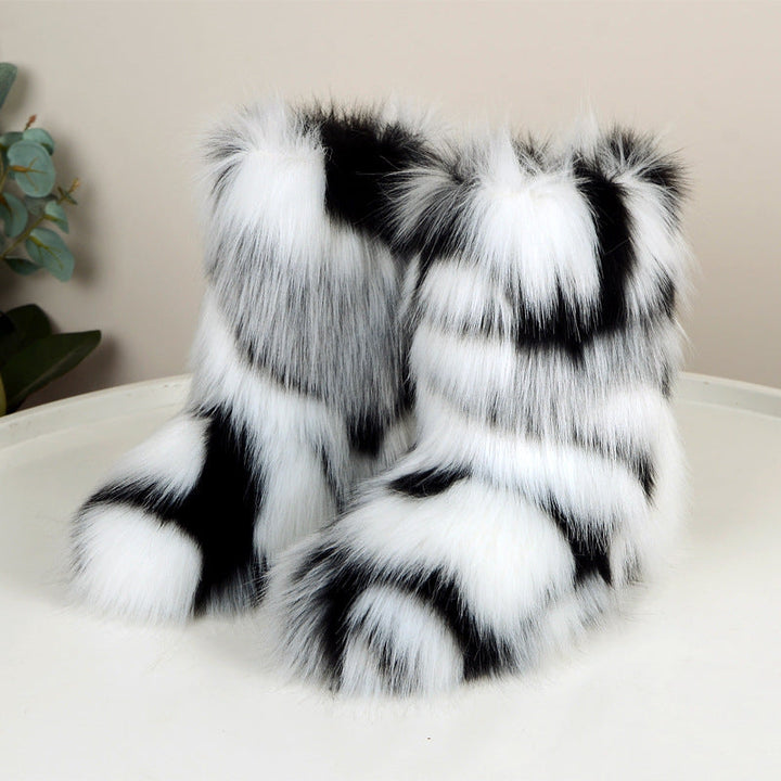 Black and white patterned faux fur boots