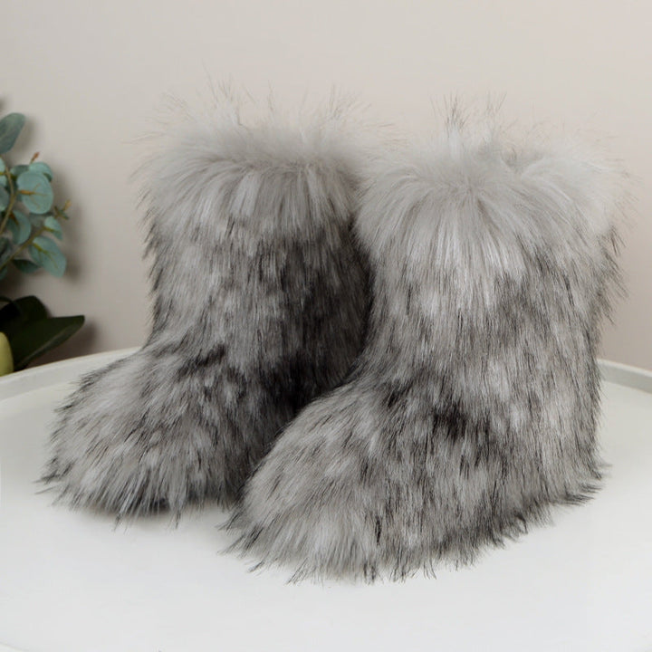 Light gray faux fur boots with tipped shaggy texture
